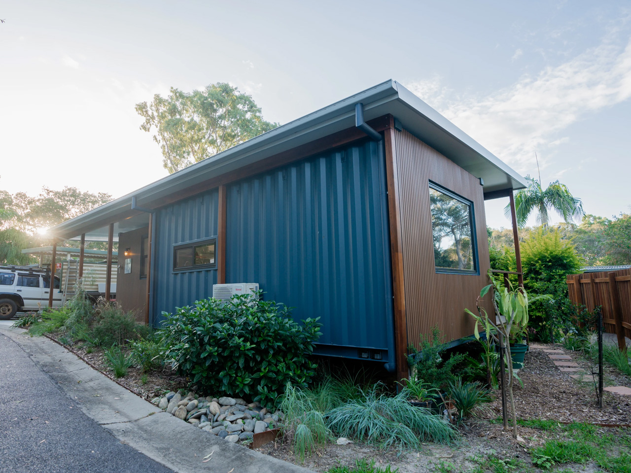 Featured image for build home from shipping containers - This L-Shaped Shipping Container Home ...