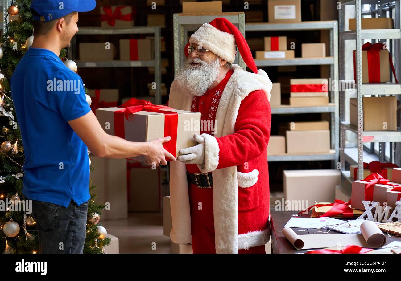 Featured image for special delivery from santa claus - Happy Santa Claus giving parcel gift ...